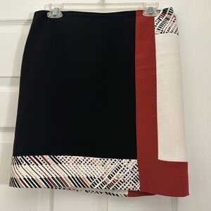 White House Black Market skirt size 4 lined. Black, white, copper